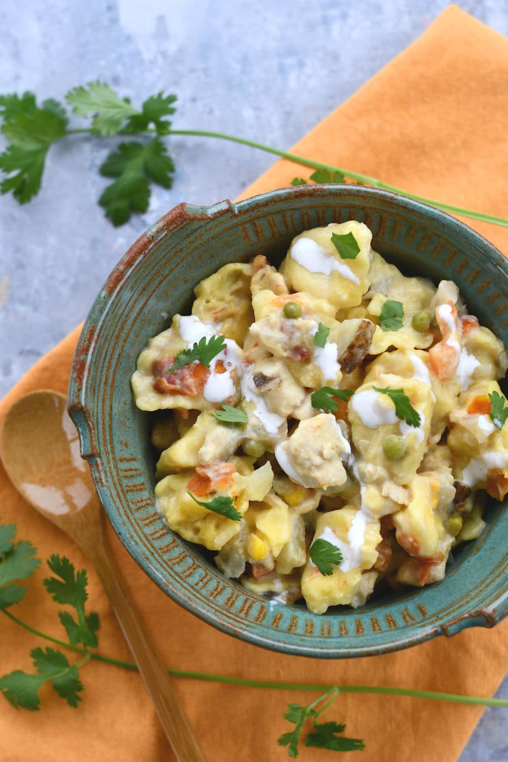 24Bite: Crock Pot Chicken and Tortellini Recipe served in a bowl by Christian Guzman
