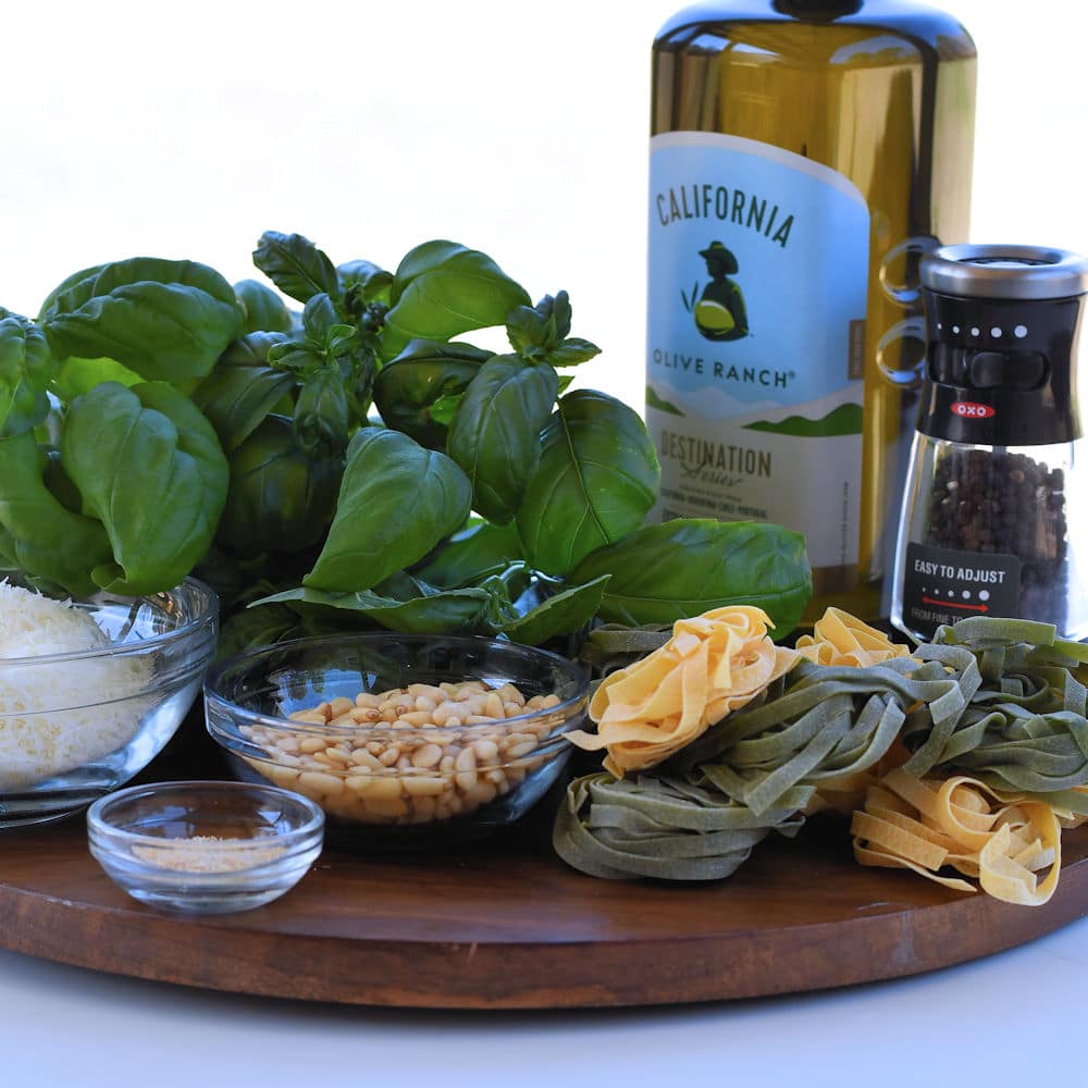 24Bite: olive oil, basil, pine nuts and pasta on wooden platter