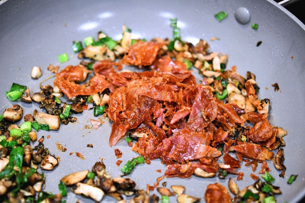 24bite: prosciutto, green onions and mushrooms in skillet to saute