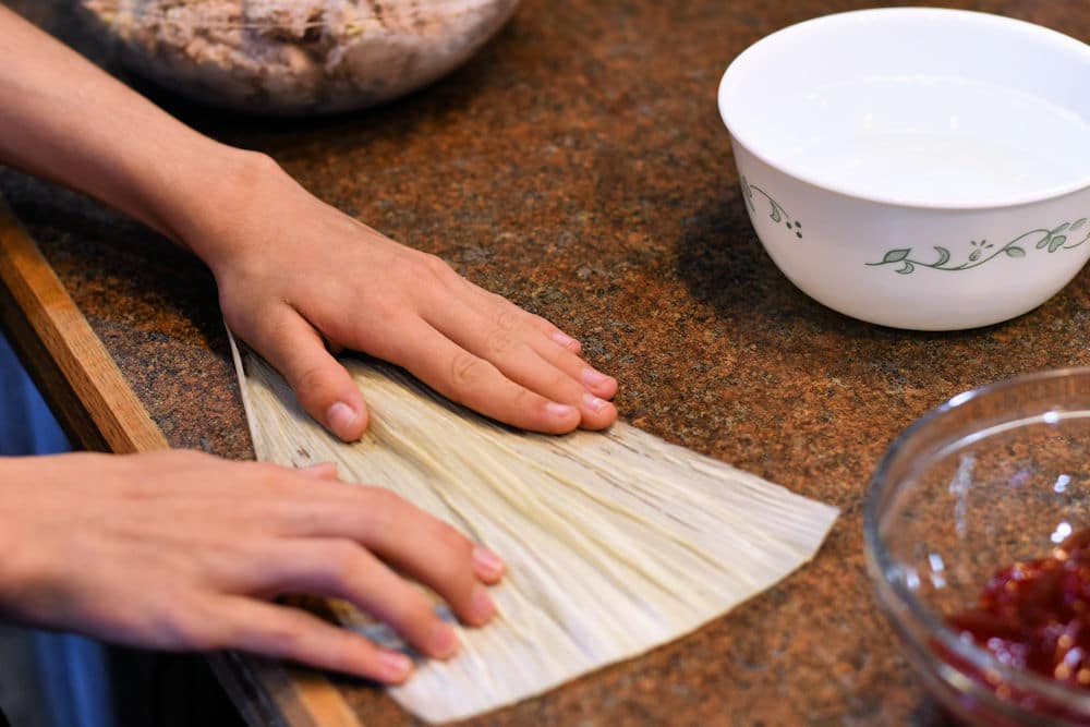 24Bite: spreading corn husk to begin making raspberry tamal