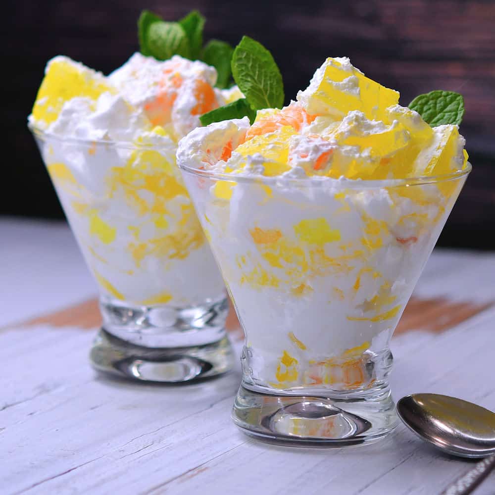 lemon gelatin dessert in glass martini glasses