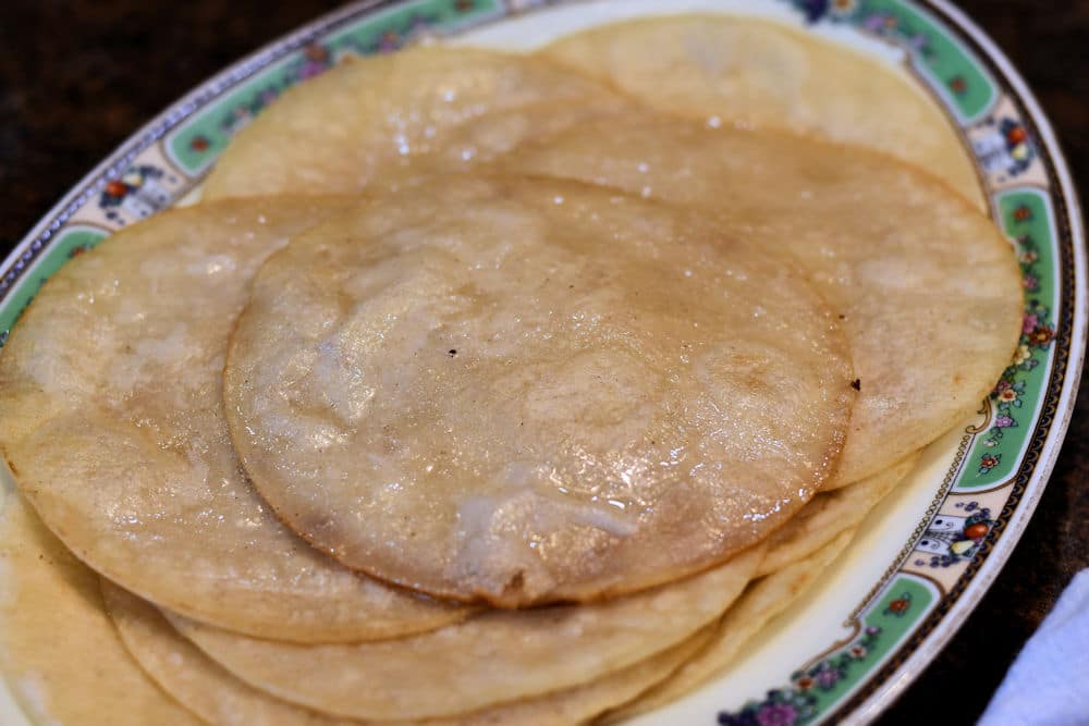 24Bite: Plate of corn tortillas after frying to soften