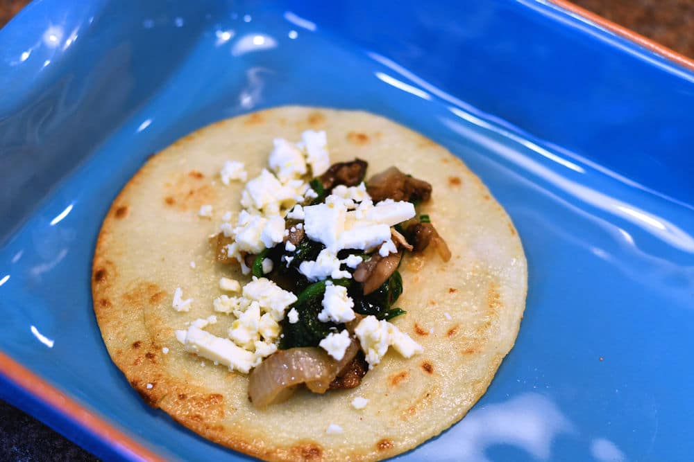corn tortilla, fried then filled with spinach, mushrooms and cheese