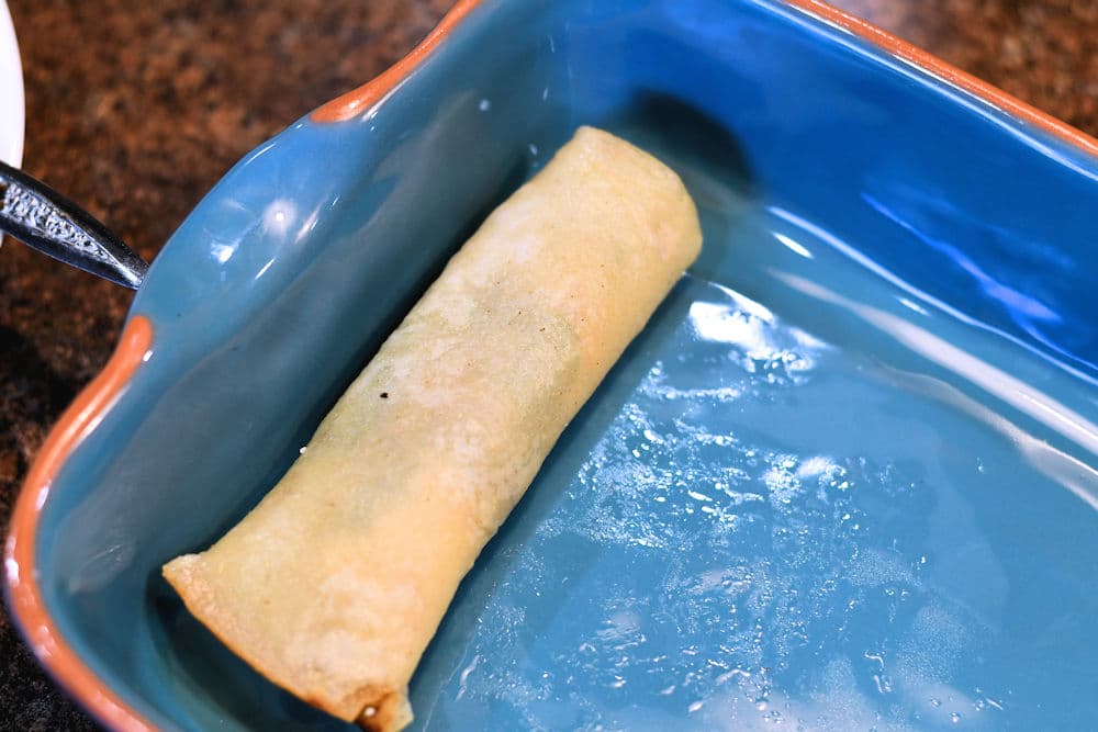 24Bite: One rolled vegetable enchilada in baking pan