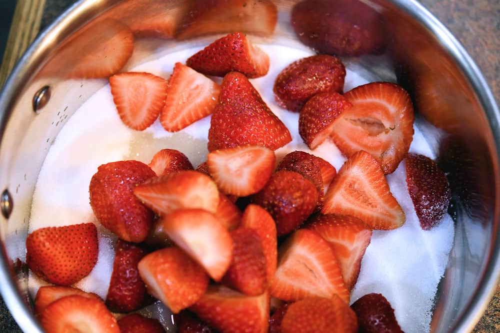 24Bite: strawberries and sugar in 3-quart sauce pan