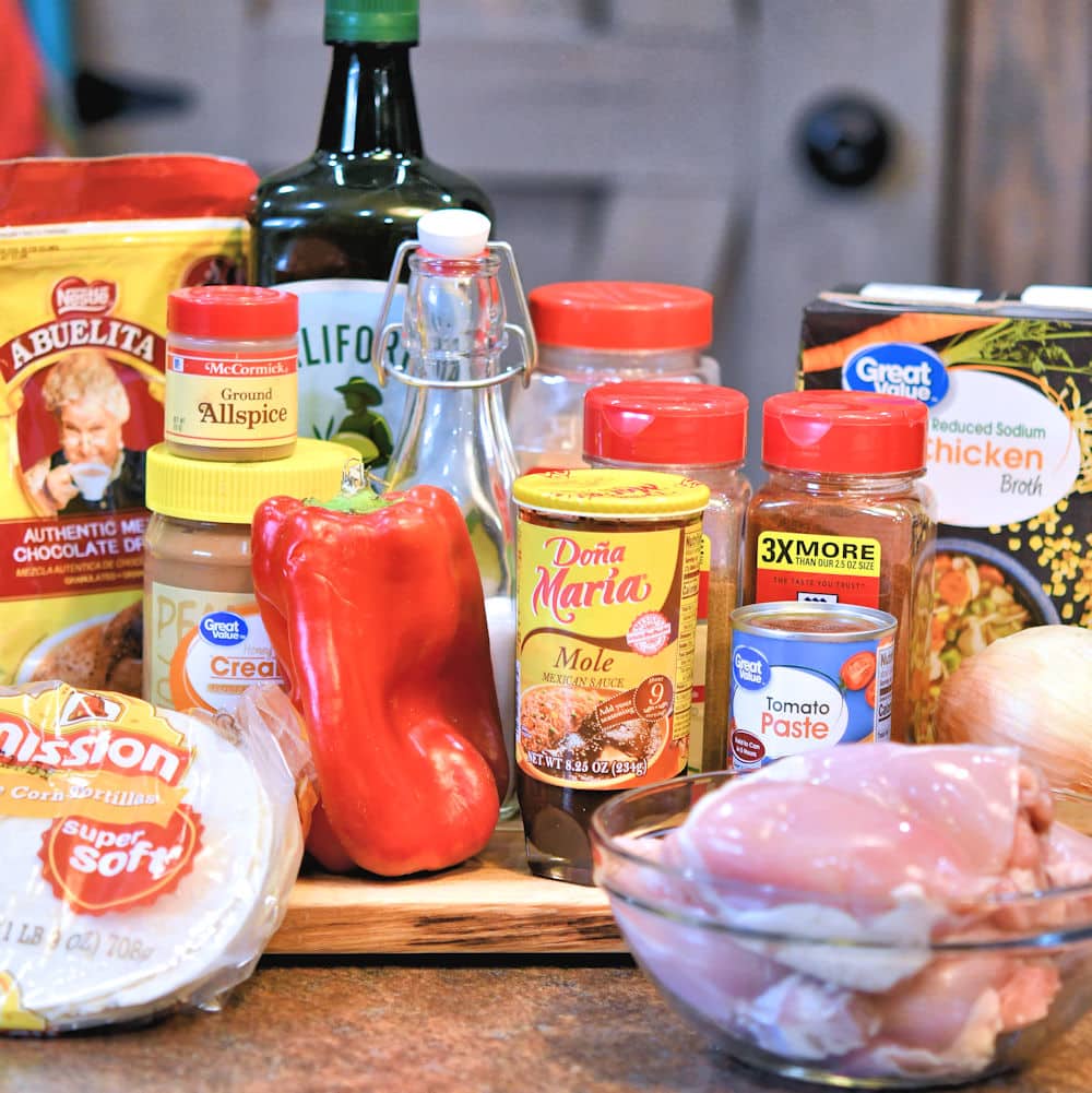 Ingredients for chicken mole including Dona Maria, Abuelita chocolate, peanut butter and spices