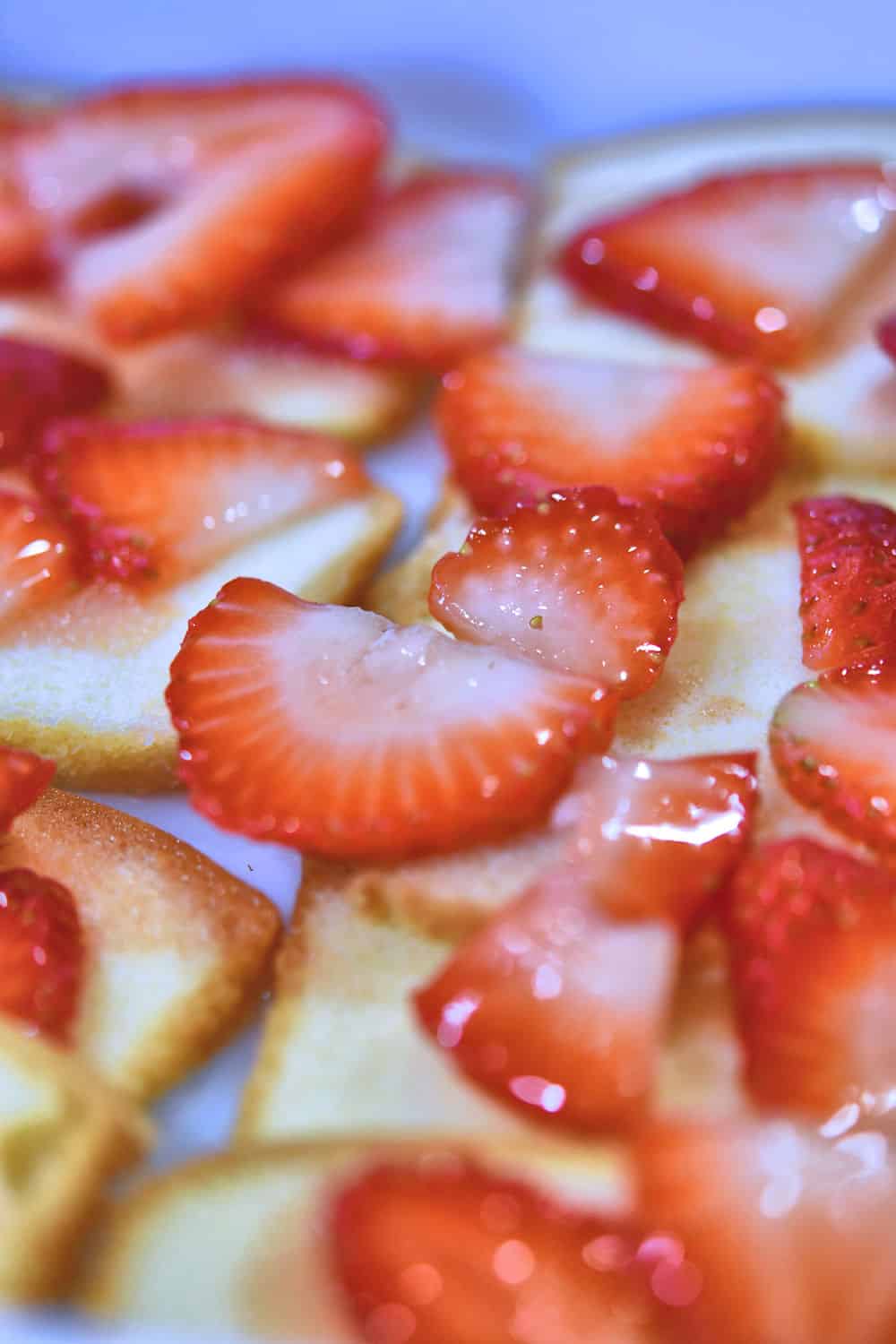 macerated strawberries layered on sliced pound cake