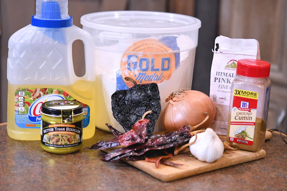 ingredients for red enchilada sauce on a countertop