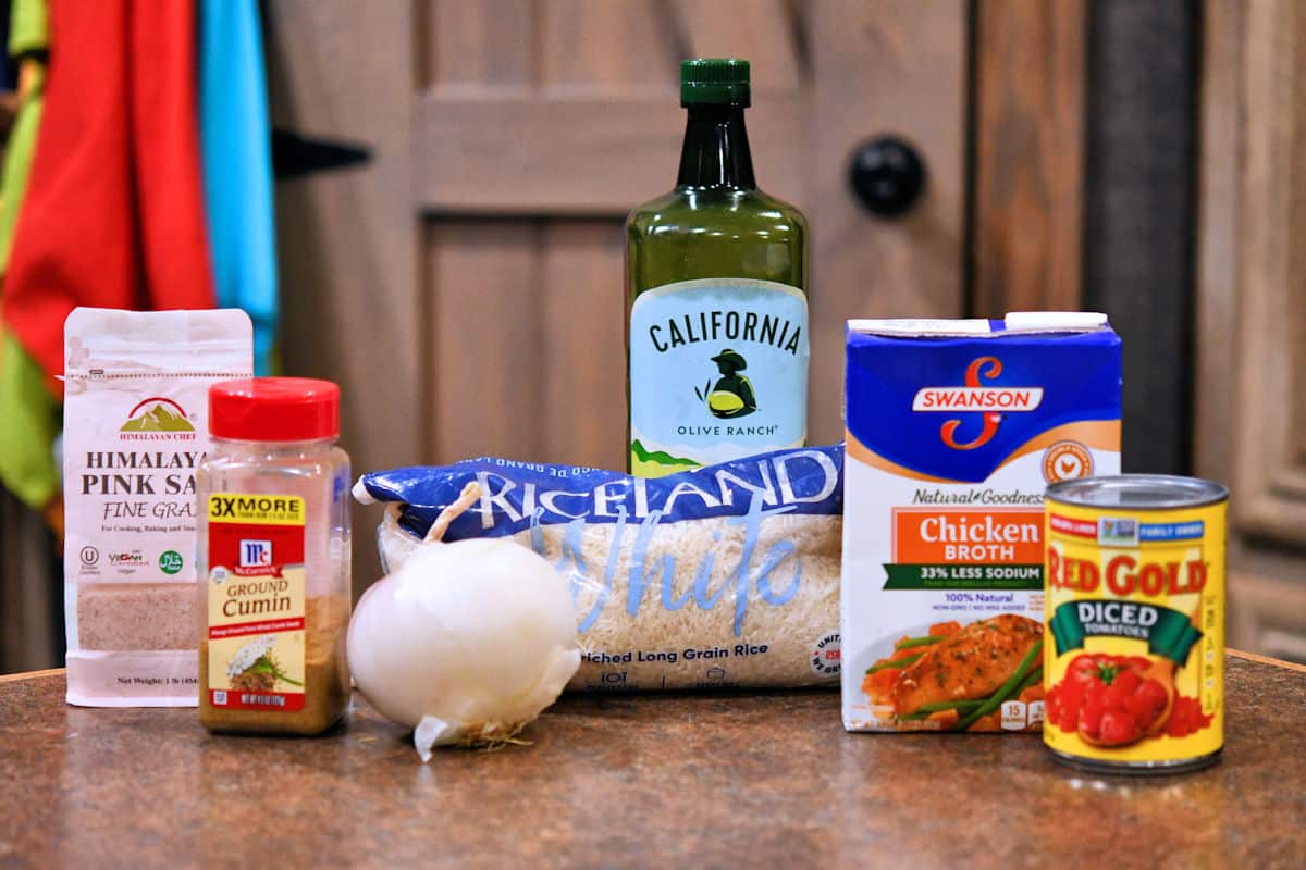 Ingredients for Mexican Red Rice displayed on a countertop