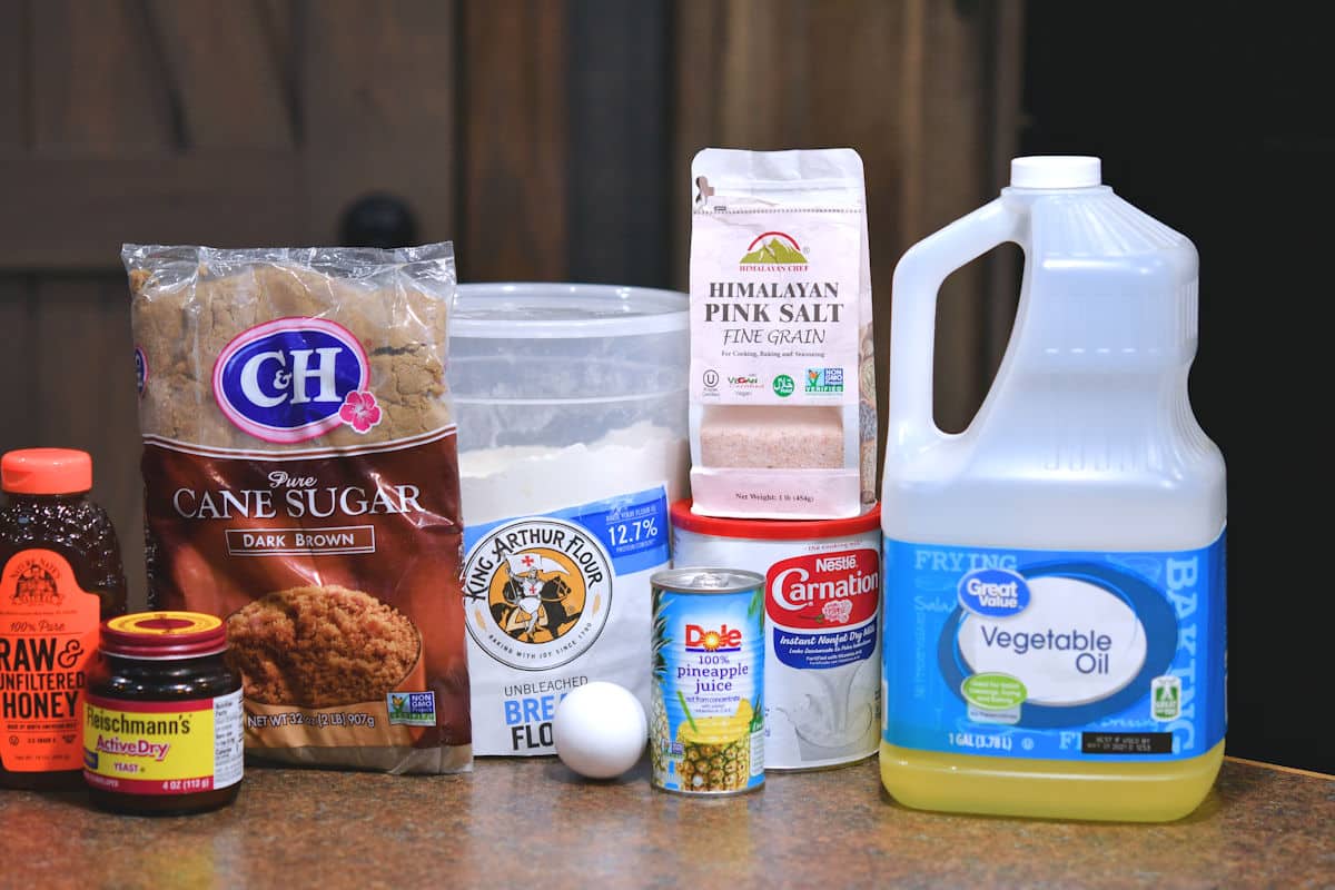 ingredients for cinnamon roll dough on a counter top