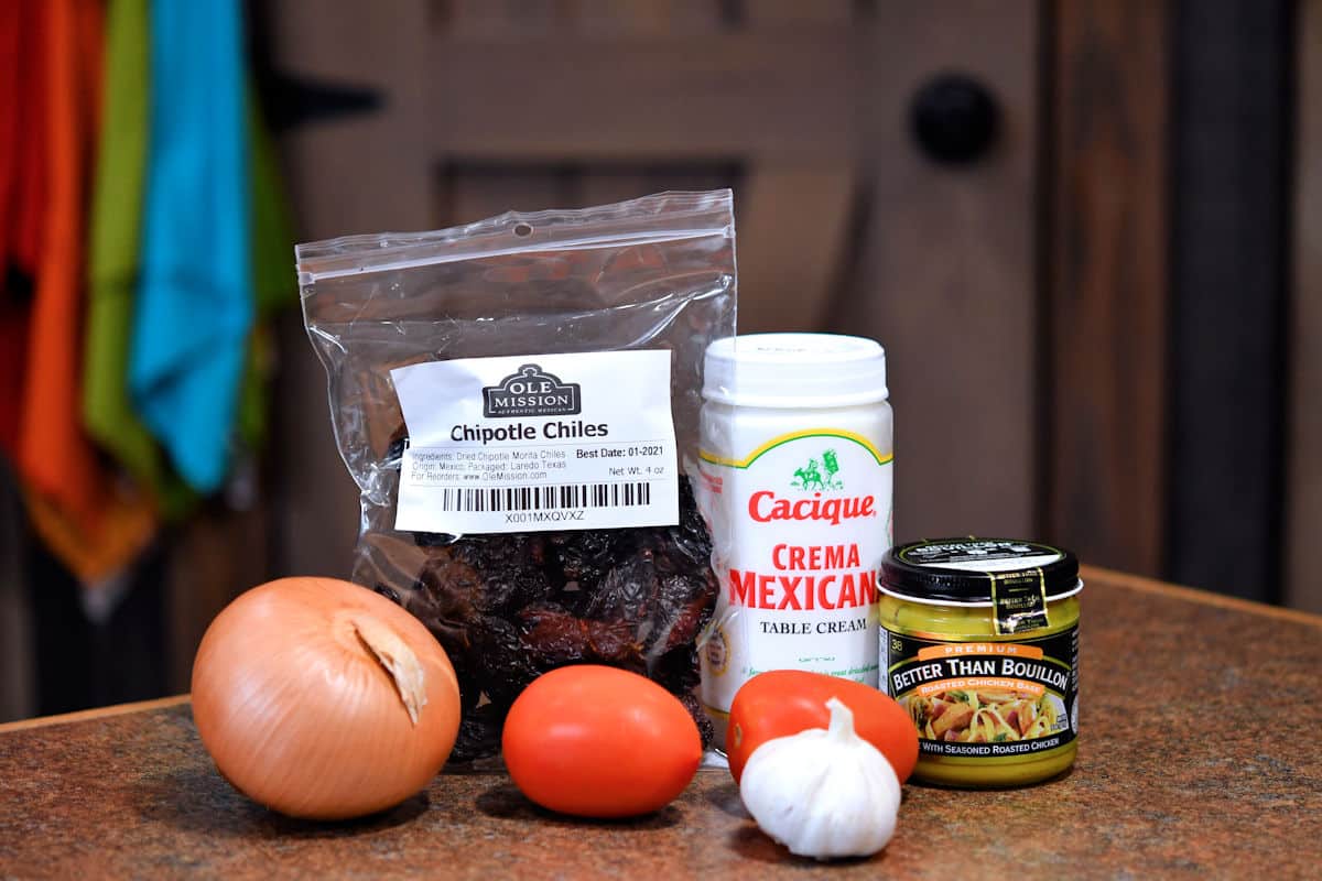 ingredients for creamy chipotle sauce on a countertop