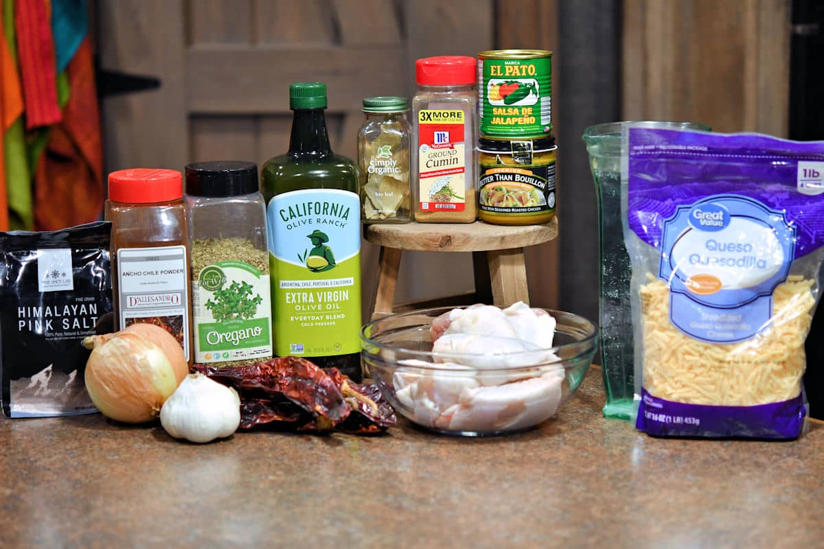 ingredients for chicken birria tacos on a countertop