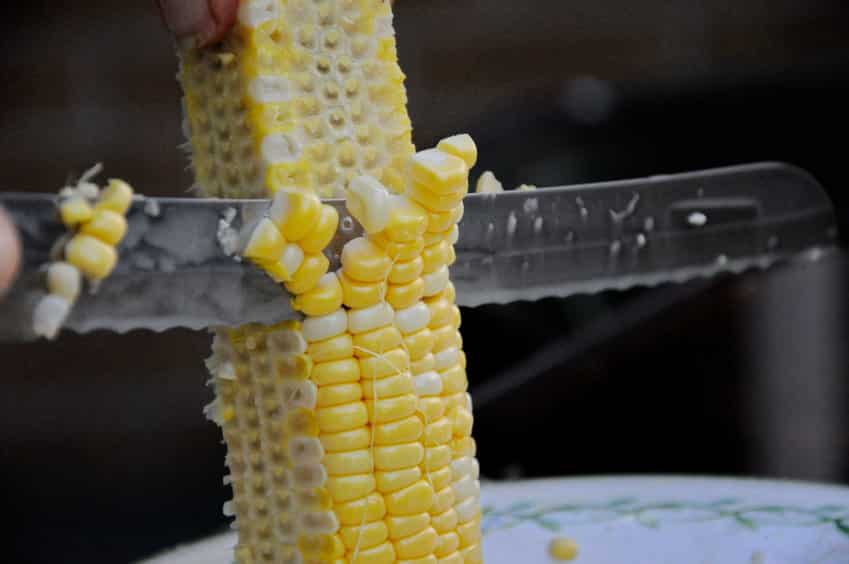 Closeup of corn being cut off the cob © bobhilscher via 123rf.com