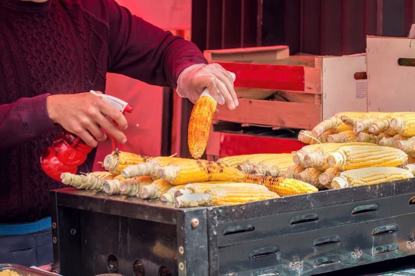 Mexican elotes on a grill, street corn vendor © jgolby via 123rf.com