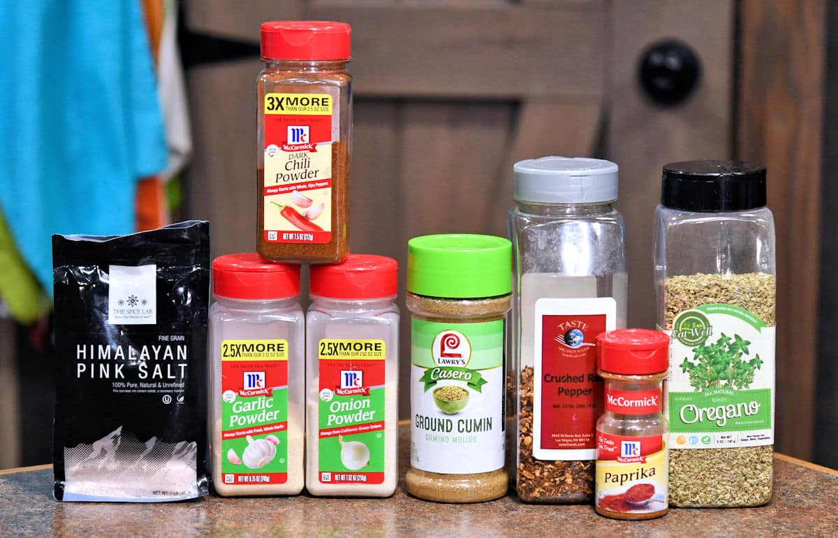 all ingredients for homemade taco seasoning on a countertop.