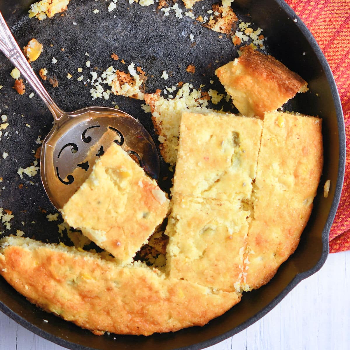 iron skillet jalapeno cornbread cut into pieces and almost finished off