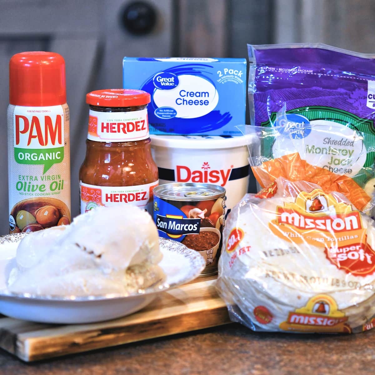 ingredients for salsa chicken enchilada on a countertop