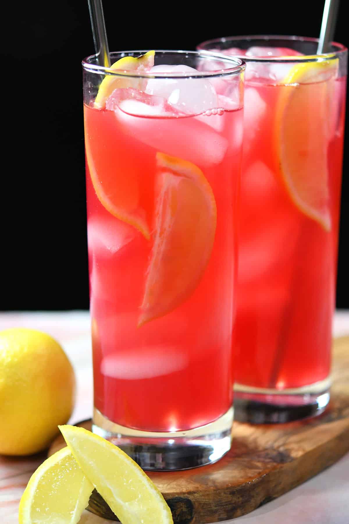closeup of tall glass of hibiscus lemonade