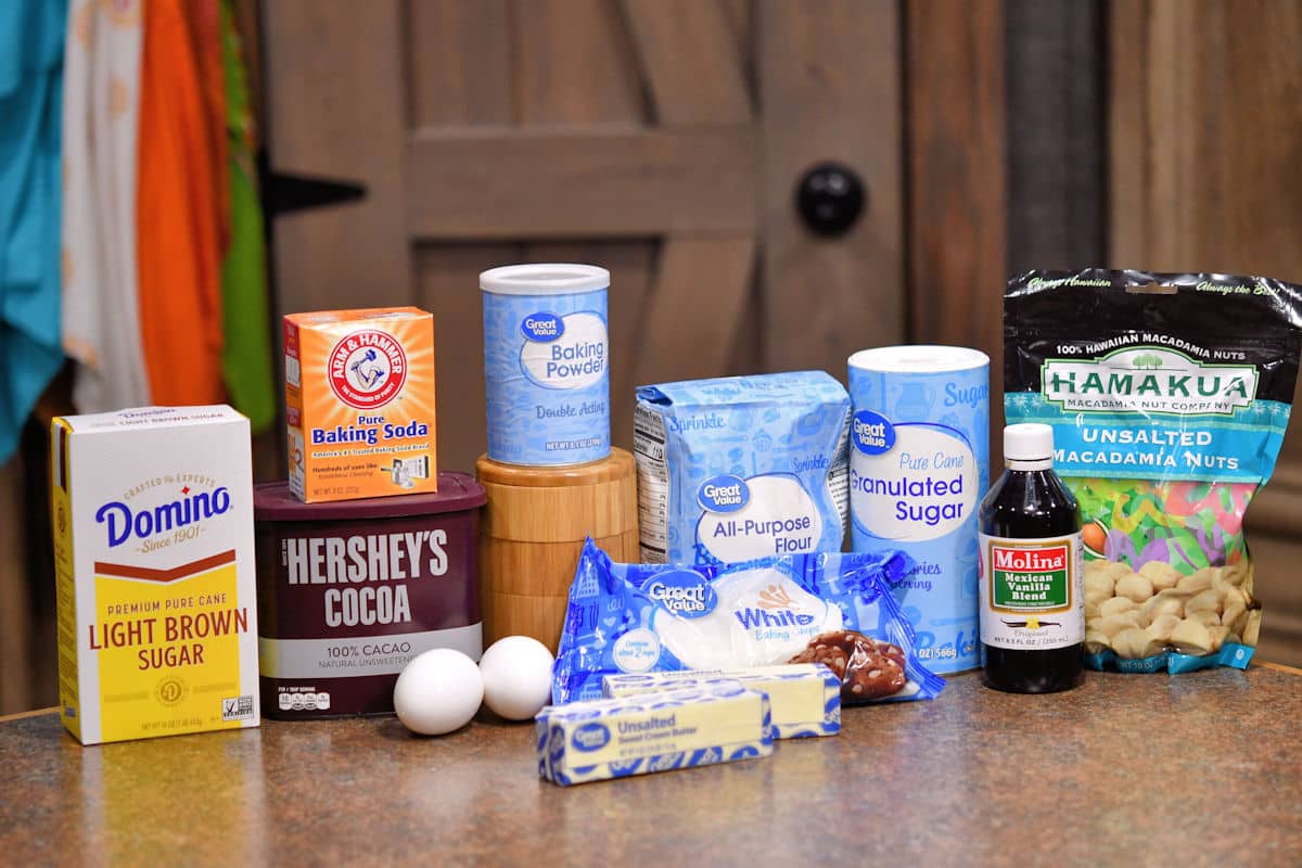 ingredients for chocolate macadamia nut cookies on a countertop