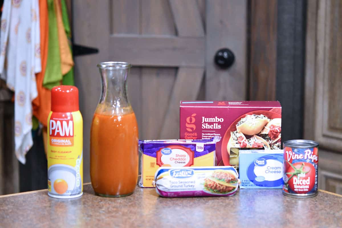 ingredients for jumbo taco stuffed shells on a countertop