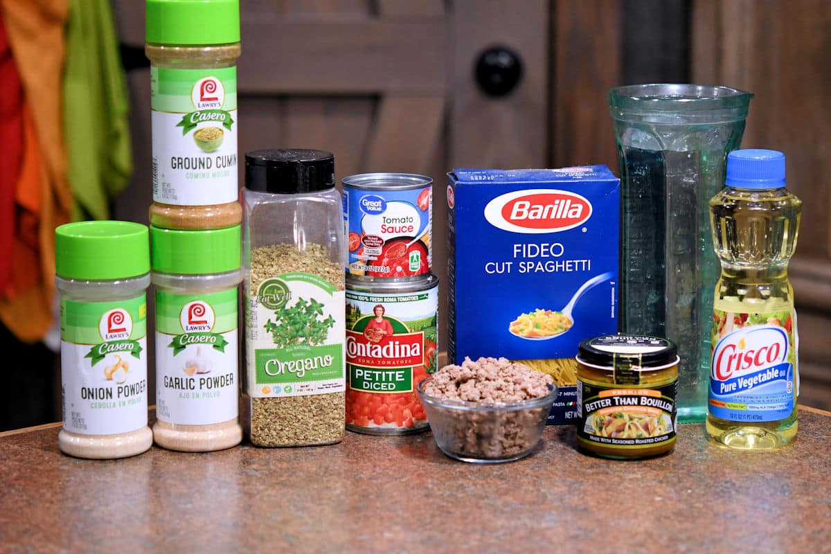 ingredients for sopa de fideos on a countertop