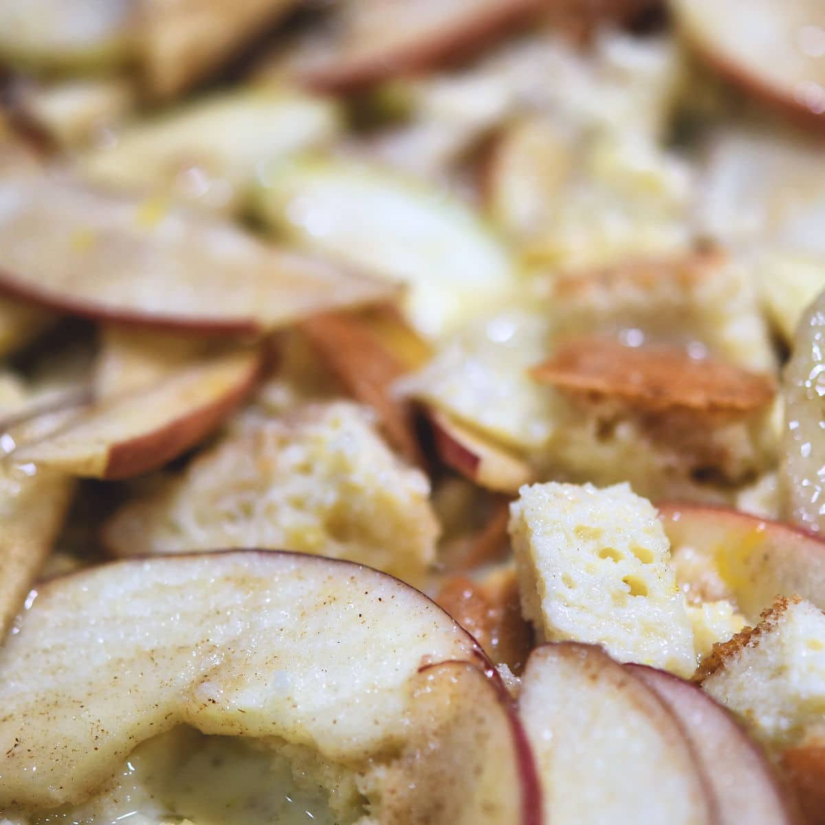 closeup of apples and bread cubes before baking