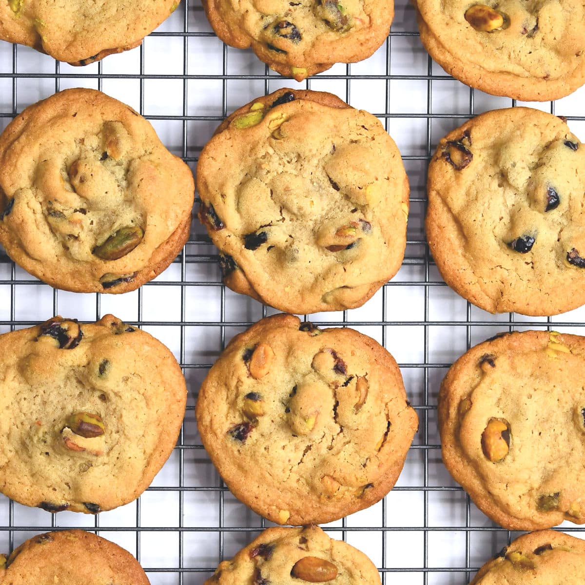 closeup of freshly baked cookies on a wire rack