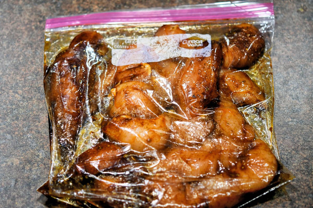 closeup of chicken marinade in zippered plastic bag