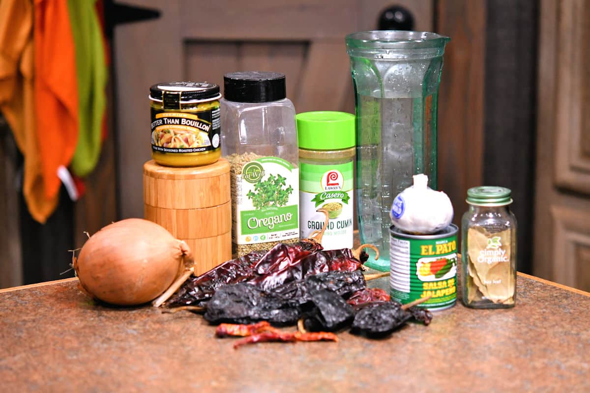 ingredients for chicken birria tacos on a countertop