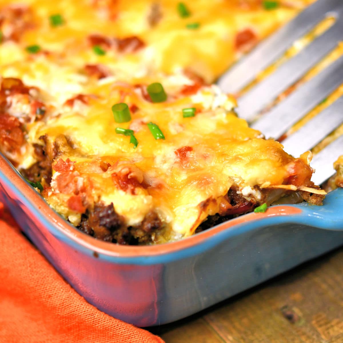 closeup of spatula lifting out piece of cowboy casserole