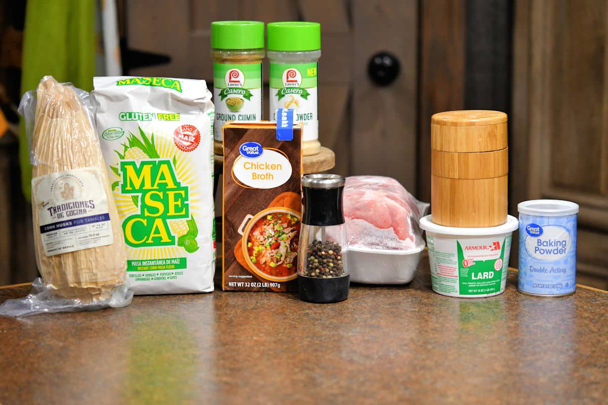 ingredients for mexican pork tamales on a countertop