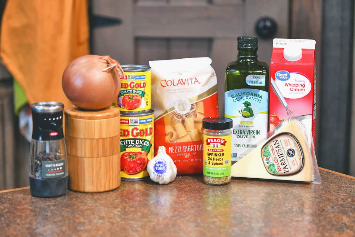 ingredients for creamy marinara pasta dinner on a countertop