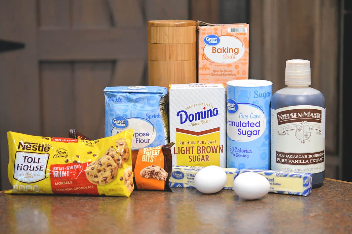 ingredients for chocolate chip toffee cookies on countertop.