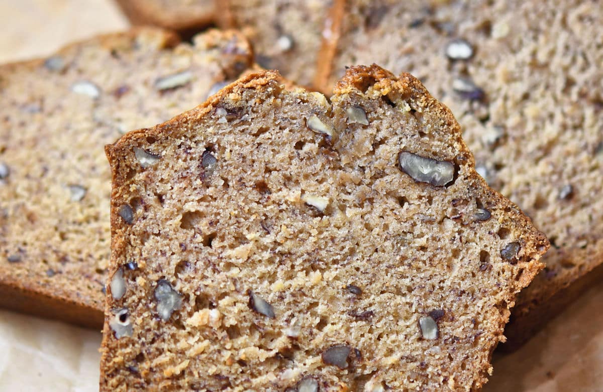 closeup of pecan banana bread with applesauce