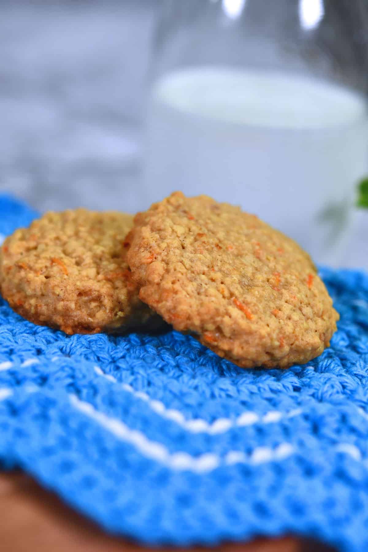 oatmeal carrot cookies on blue crocheted cloth.