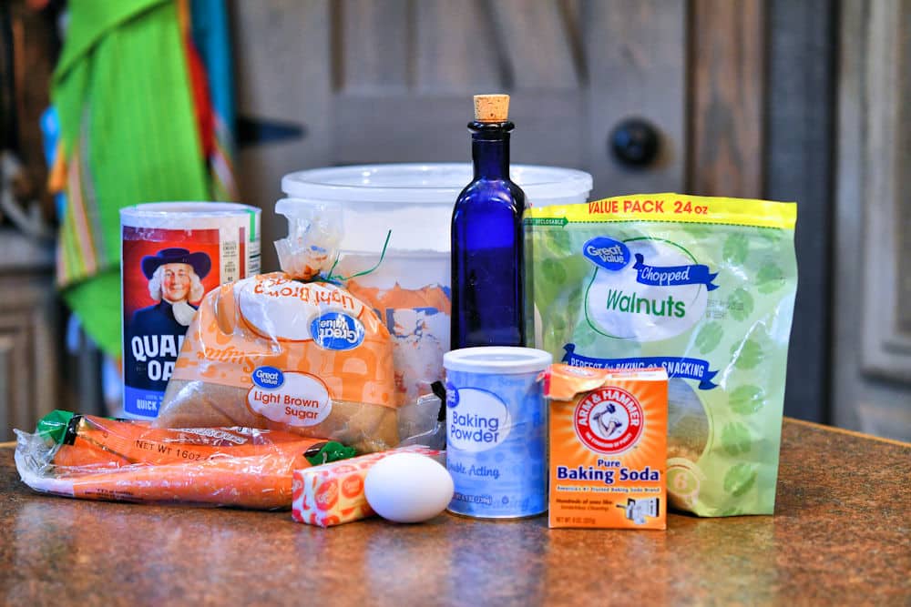 ingredients for oatmeal carrot cookies on countertop.