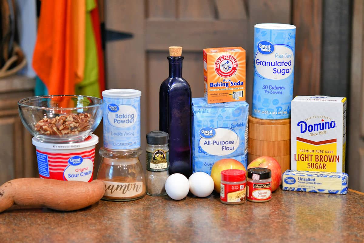 ingredients for sweet potato bread, displayed on a countertop.