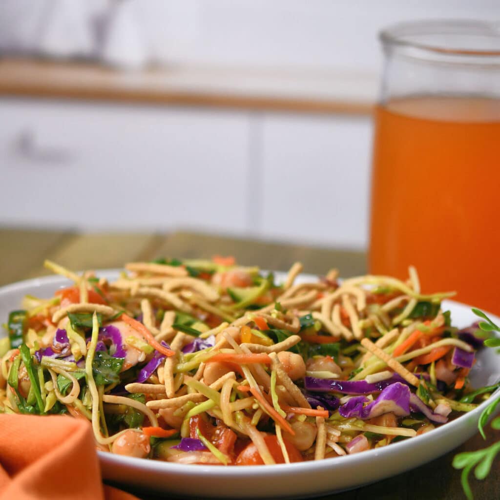 Asian Inspired Broccoli Slaw Salad on white ceramic plate
