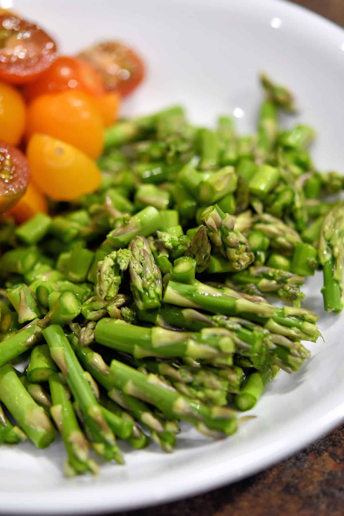 asparagus spears prepped with the tops cut and ready for cooking
