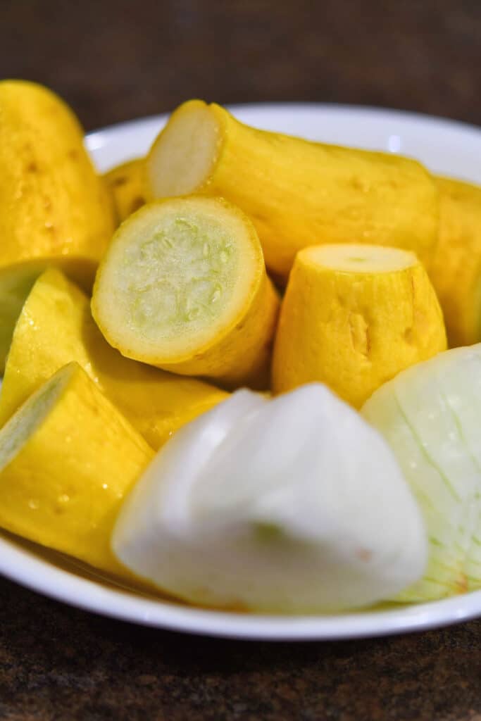 yellow squash and onion, cut up and ready for cooking