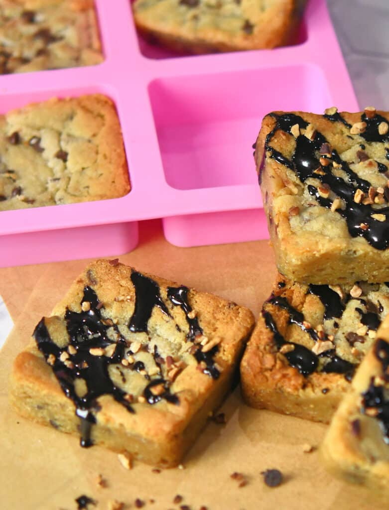 decorated chocolate chip cookie bars in a silicone mold